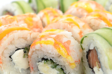 background of different sushi rolls