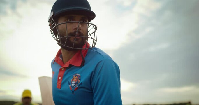 Indian Cricket League Player Ready for Batting, Prepared to Hit the Ball to Score Runs for His Professional Team. Portrait of a Handsome Athlete Concentrated on Bowler Before the Shot