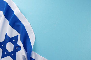 Concept of Israeli symbols. Top view photo National flag of Israel on pastel blue background with...