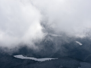 Winter Landscape with Low Clouds in the Mountain