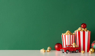 Create festive atmosphere for Noel with home popcorn delivery idea. Side view of tabletop,...