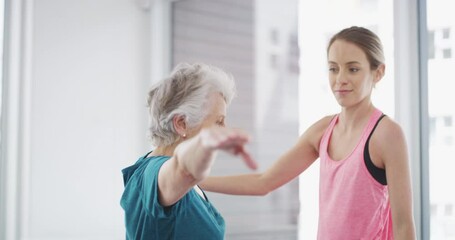 Senior woman, fitness and personal trainer for yoga, class and help from instructor, exercise and balance. Active, pilates and health for wellness, stretching or healthy with smile, friendly or elder