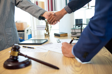 Businessmen and investors sign contract in front of company legal advisor and witness contract for...