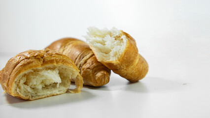 Croissants on a white background. Delicious, fresh croissants on a white background.