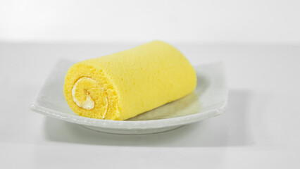 Banana roll cake. Banana roll cake on a white crate background.