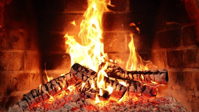 Fire in fireplace Watch This Fireplace Transform Your Evening.Cozy Fireplace Night .Burning fireplace will help you unwind in the perfect atmosphere