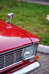turn signal lamp of a red retro car. 