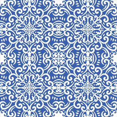 Pattern blue and white. Winter decor, snowflakes,christmas decor. Seamless pattern tile with Victorian motives.Ceramic tile in talavera style. Ornamental blue and white patterns for any decor.