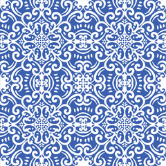 Pattern blue and white. Winter decor, snowflakes,christmas decor. Seamless pattern tile with Victorian motives.Ceramic tile in talavera style. Ornamental blue and white patterns for any decor.