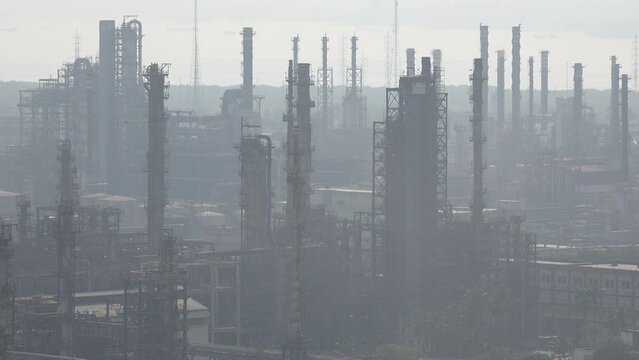 Pipelines and smokestacks of a major oil and gas refinery in Mumbai, heavy industry in India
