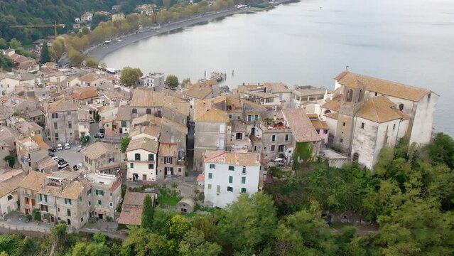 Aerial view of the historic center of Anguillara, in the metropolitan city of Rome, Italy. The town is located on the shores of Lake Bracciano.