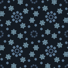Christmas winter seamless background with snowflakes. Dark blue background with snowflakes