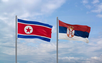 Serbia and North Korea flags, country relationship concept