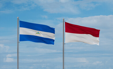 Indonesia and Nicaragua flags, country relationship concept