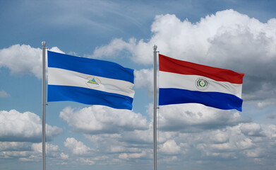 Paraguay and Nicaragua flags, country relationship concept