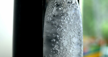 Detailed View - Filling Bottle from Sprinkle Water Machine, Essence of Refreshing Beverage