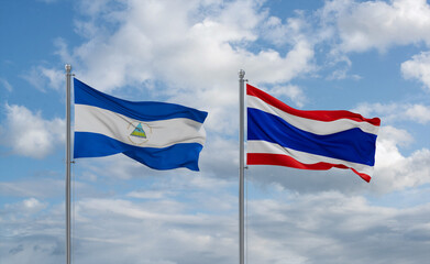 Thailand and Nicaragua flags, country relationship concept