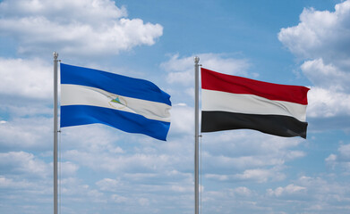 Yemen and Nicaragua flags, country relationship concept