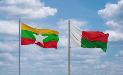 Madagascar and Myanmar flags, country relationship concept