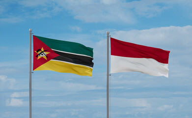 Indonesia and Mozambique flags, country relationship concept