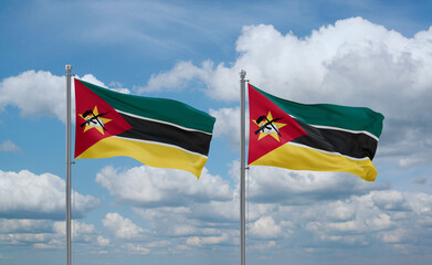 Two Mozambique flags, country relationship concept