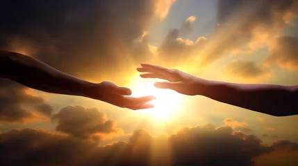 Foto op Plexiglas Hand reaching out for help in front of bright sunset sky  © IBEX.Media