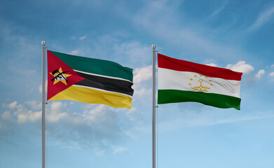 Tajikistan and Mozambique flags, country relationship concept