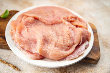 raw turkey fillet slice fresh poultry meat cooking meal food snack on the table copy space food background rustic top view 