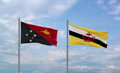 Brunei and Papua New Guinea flags, country relationship concepts
