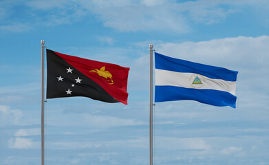 Nicaragua and Papua New Guinea flags, country relationship concept
