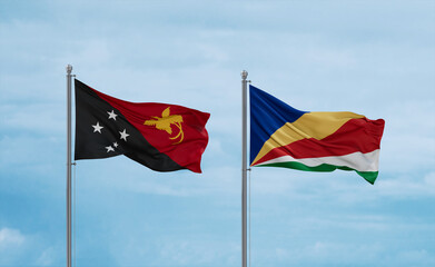 Seychelles and Papua New Guinea flags, country relationship concept