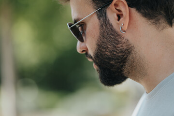 Fototapeta premium Side photo of businessman wearing eyeglasses.