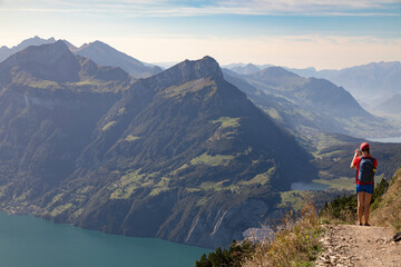 Fototapeta na wymiar Hiker in the mountains, Stoos, Schwyz, Switzerland 