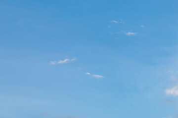 Beautiful colored sky background with few clouds.