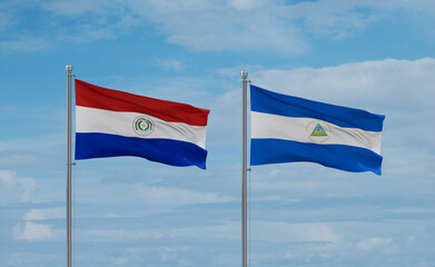 Nicaragua and Paraguay flags, country relationship concept