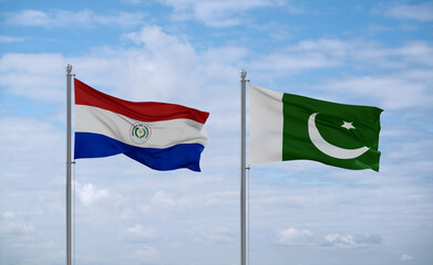 Pakistan and Paraguay flags, country relationship concept