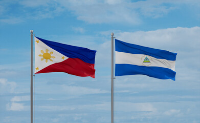 Nicaragua and Philippines flags, country relationship concept