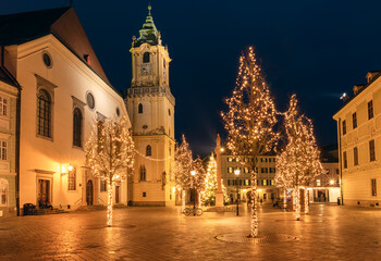 Fototapeta na wymiar Christmas trees on the main market square in Bratislava - Slovakia