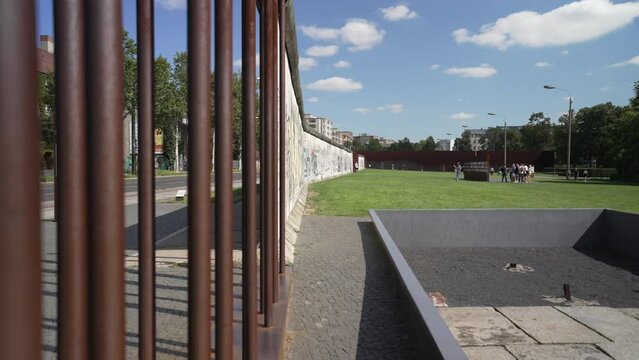 View of city tram and remaining wall at the Berlin Wall Memorial, Memorial Park, Bernauer Strasse, Berlin