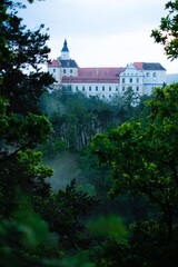 Fototapeta na wymiar Jevišovice castle photographed from a forest. South Moravia region in Czech republic.
