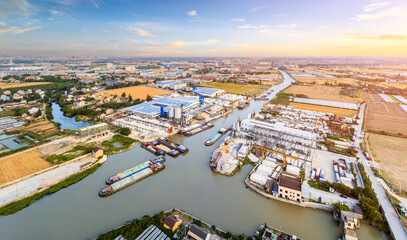 Industrial buildings and dock landscape at sunset