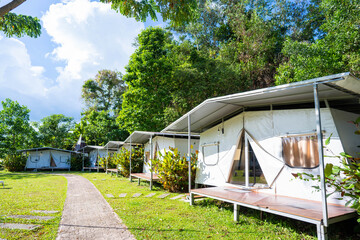 tent house at camping area with bonfire