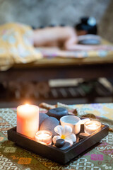 candle and oil set in spa massage room