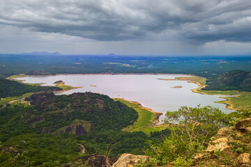 Fototapeta premium A wide angle view of Aliyar Dam from Laom's View point, Pollachi -Valparai Road, Tamil Nadu