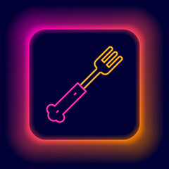 Glowing neon line Fork icon isolated on black background. Cutlery symbol. Colorful outline concept. Vector