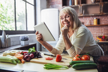 Old woman in the kitchen