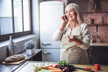 Old woman in the kitchen
