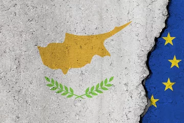 Gordijnen Cyprus and EU flag cracked on a concrete background © MCGORIE