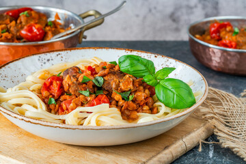 Meatballs in a tomato and lentil sauce with linguine pasta