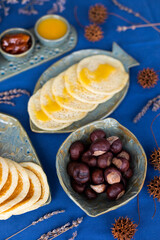 Homemade Moroccan traditional pancakes Baghrir with creamy honey sauce